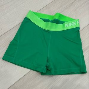 green nike pro spandex shorts